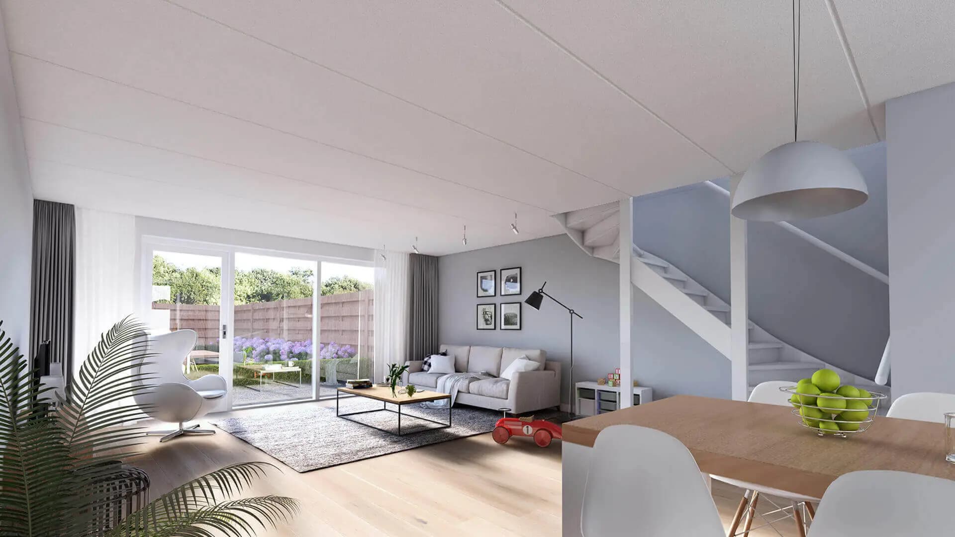 Nieuwbouw van 14 rijwoningen in Wolvega met karakteristieke jaren-dertig architectuur, metselwerk accenten, spekbanden en moderne bloemkozijnen.